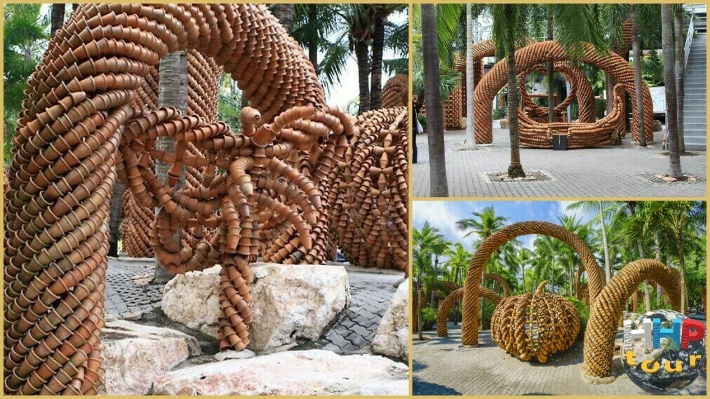 Бабочка, тайская лодка, тыква из цветочных горшков. Парк Нонг Нуч Паттайя.