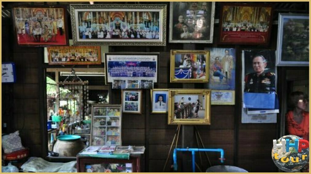 Экскурсия Река Квай + Сафари. Кокосовый домик тайца, фото галерея на стене.